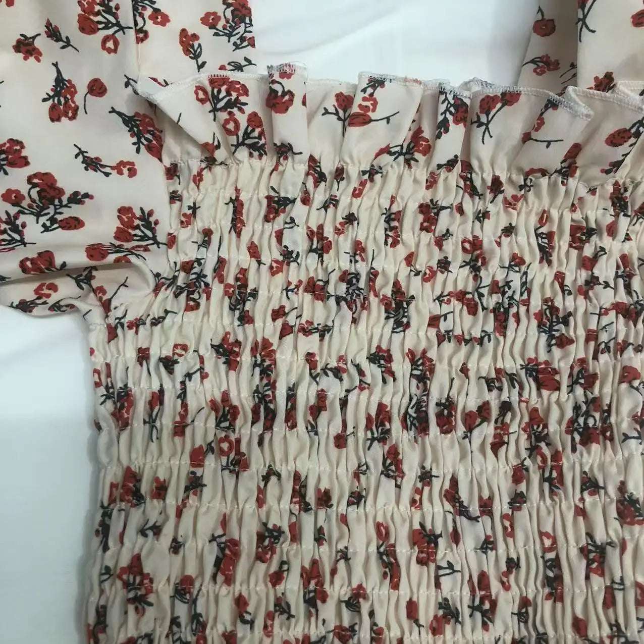 2025 printemps été nouvelle robe femmes Mini robes femme à manches courtes buste élastique imprimé fleuri plissé dos nu tenue décontractée