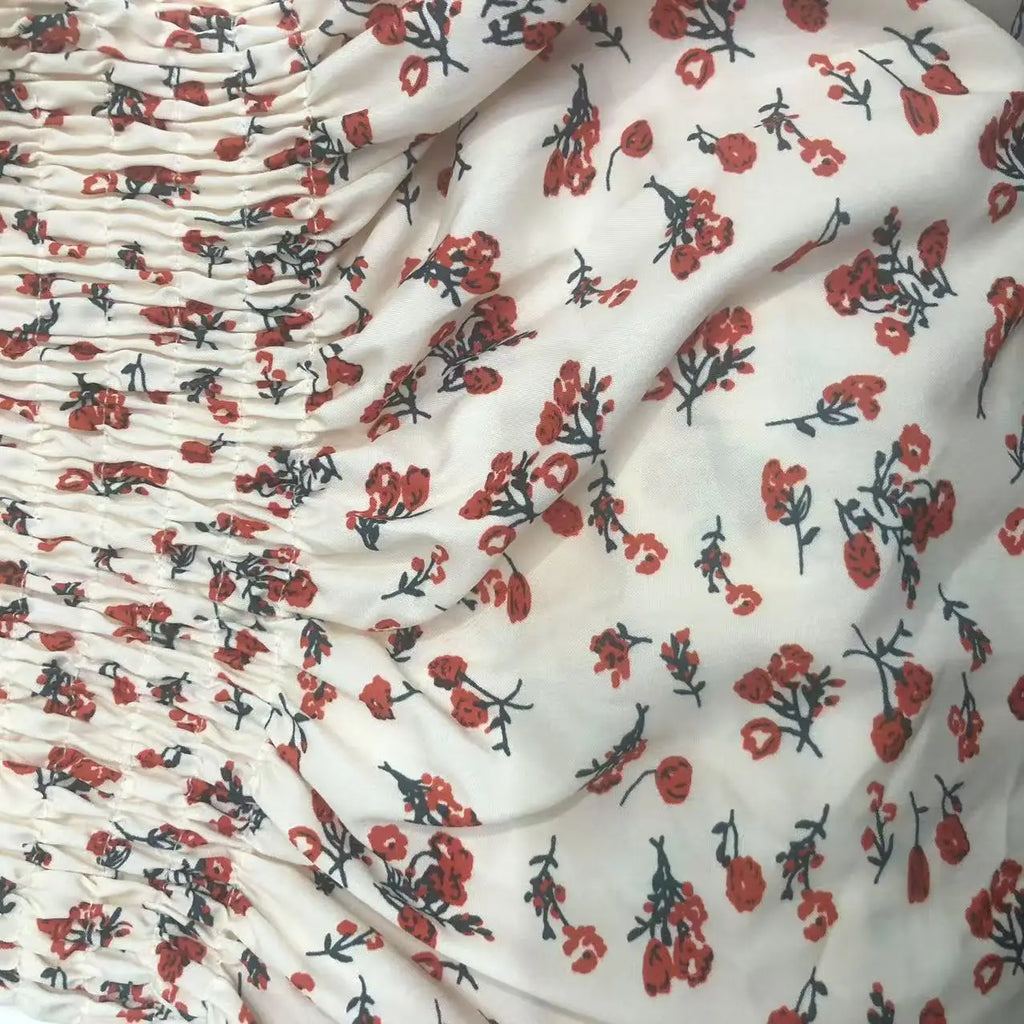 2025 printemps été nouvelle robe femmes Mini robes femme à manches courtes buste élastique imprimé fleuri plissé dos nu tenue décontractée