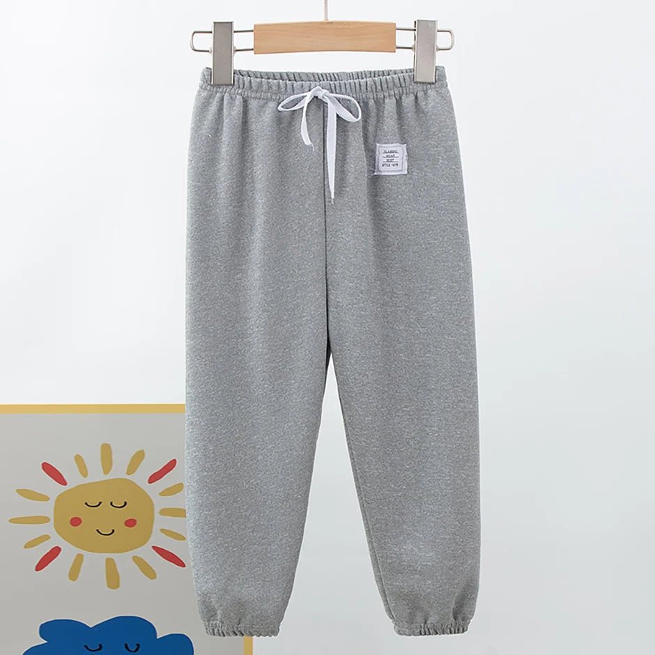 1/3 Pack enfants printemps couleur unie pantalons garçons et filles loisirs tendance taille élastique pantalon grand garçon sport Joker Harun pantalons