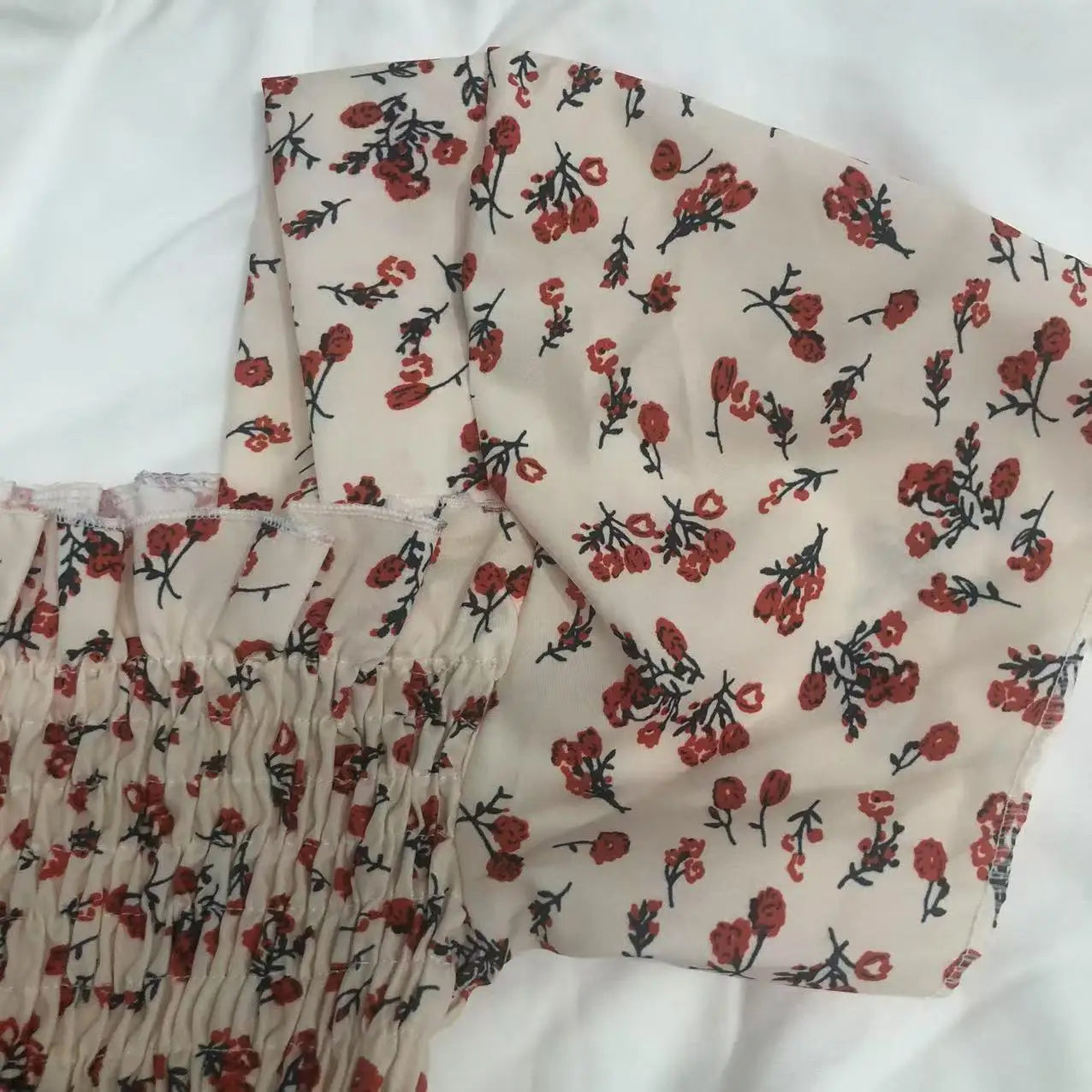 2025 printemps été nouvelle robe femmes Mini robes femme à manches courtes buste élastique imprimé fleuri plissé dos nu tenue décontractée
