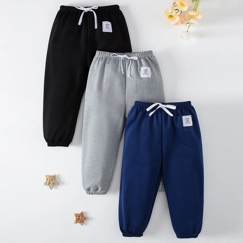 1/3 Pack enfants printemps couleur unie pantalons garçons et filles loisirs tendance taille élastique pantalon grand garçon sport Joker Harun pantalons
