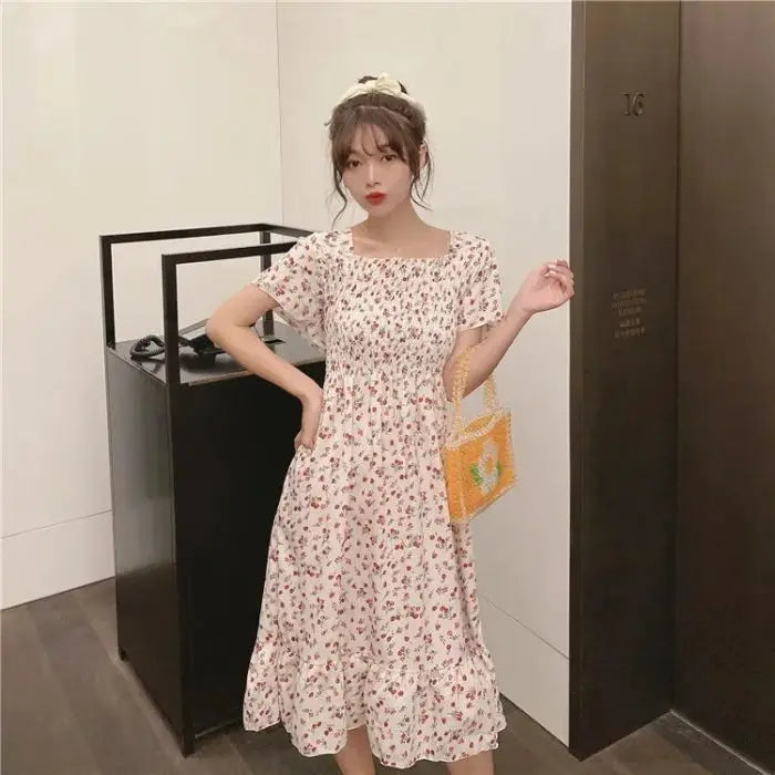 2025 printemps été nouvelle robe femmes Mini robes femme à manches courtes buste élastique imprimé fleuri plissé dos nu tenue décontractée